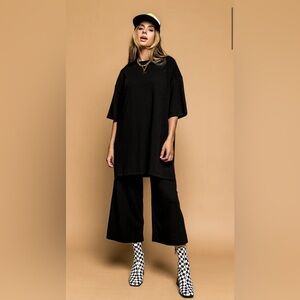 Dressed in LaLa Lex Ribbed Playsuit in Black